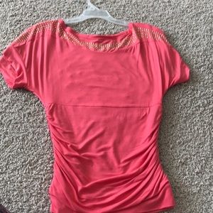 Peach and gold tighter fitting shirt